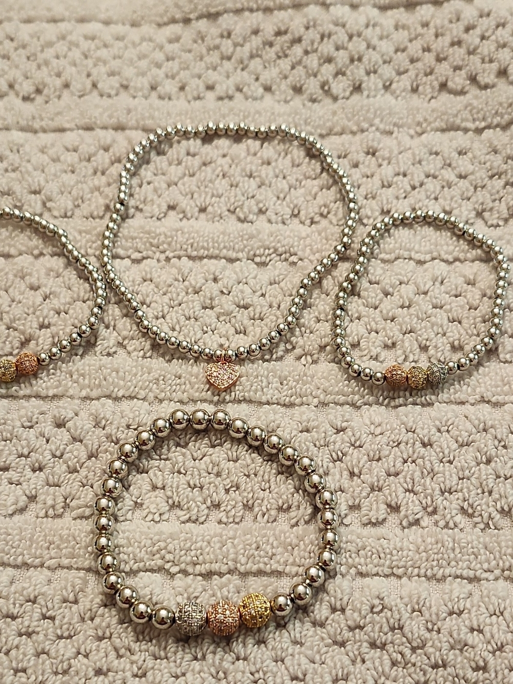 4 Silver Tone Beaded Bracelet with Rose Gold Heart Accent 0197